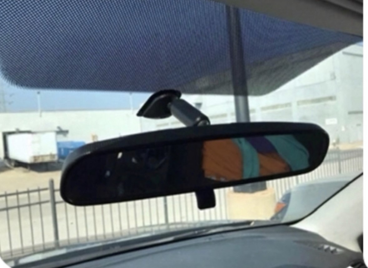 standard rear view mirror with tab on bottom
